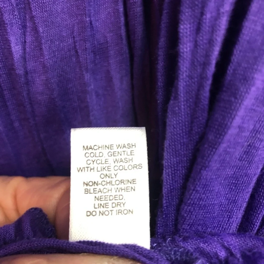 Purple ruffle neck, sleeveless top no brand no size please view measurements